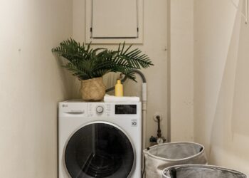 A laundry room with a washer and dryer