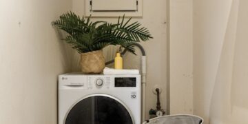 A laundry room with a washer and dryer