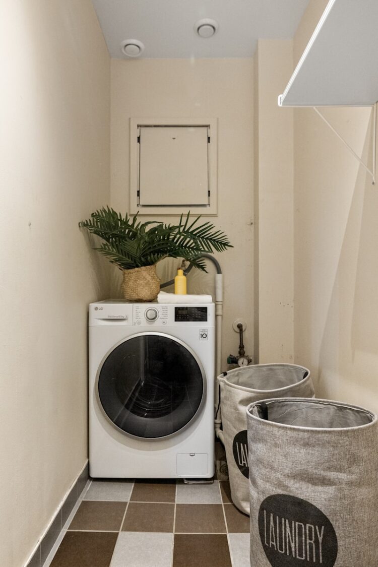 A laundry room with a washer and dryer