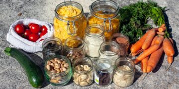 clear glass jars with green leaves