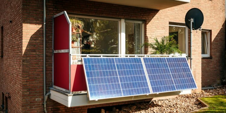 Solar panels on a brick building balcony.